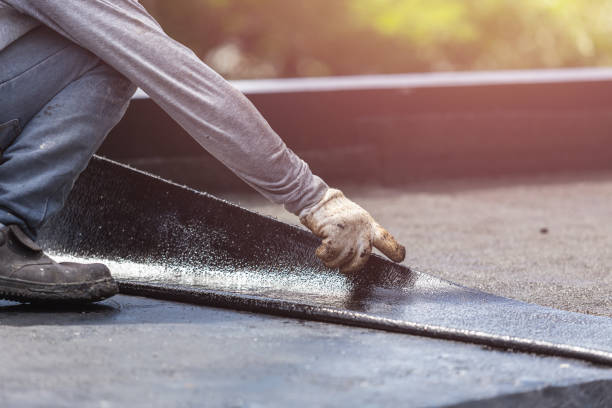 Professional Waterproofing technician working in Eaton Rapids, MI